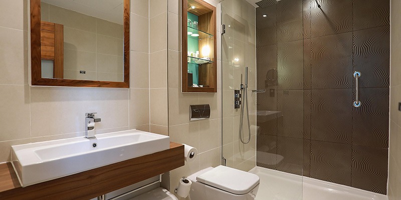 accessible bathroom with handrails